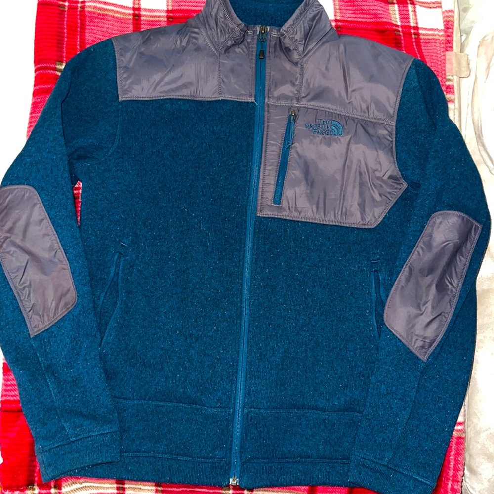 Blue and gray women’s North-face